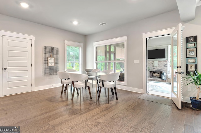 29 Peppertree Dr, Newnan, GA 30265 - dining space with wood finished floors, recessed lighting, and a fireplace