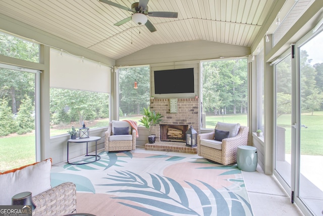 29 Peppertree Dr, Newnan, GA 30265 - sunroom featuring a fireplace, ceiling fan, and lofted ceiling