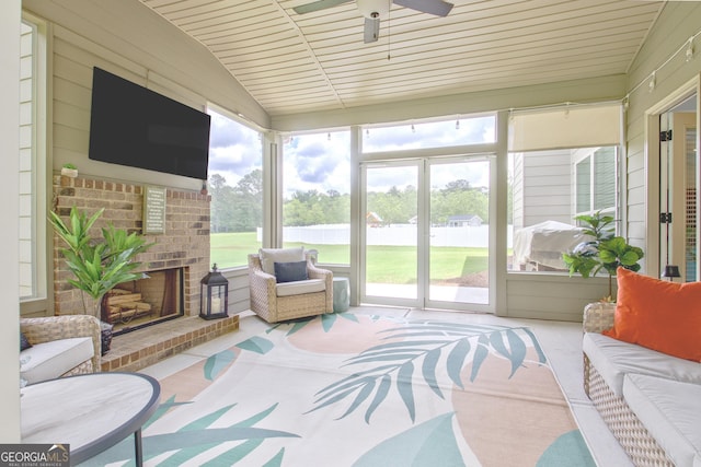 29 Peppertree Dr, Newnan, GA 30265 - sunroom / solarium with an outdoor living space with a fireplace, a ceiling fan, healthy amount of natural light, and lofted ceiling