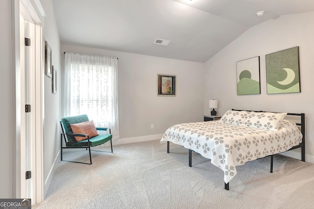 29 Peppertree Dr, Newnan, GA 30265 - carpeted bedroom featuring vaulted ceiling and baseboards