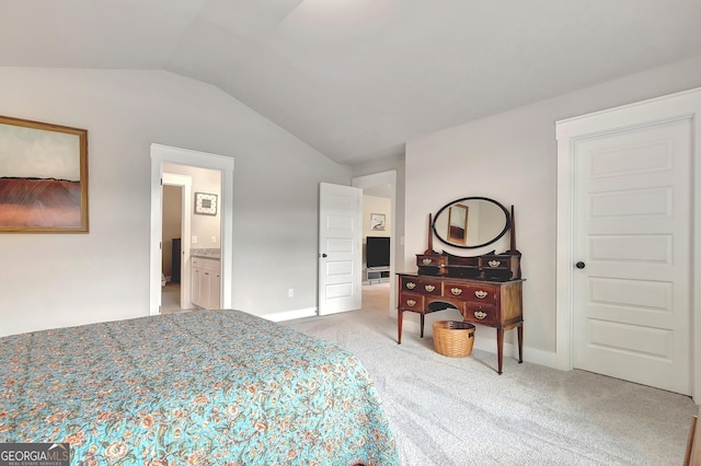 29 Peppertree Dr, Newnan, GA 30265 - bedroom with vaulted ceiling, light carpet, and ensuite bath