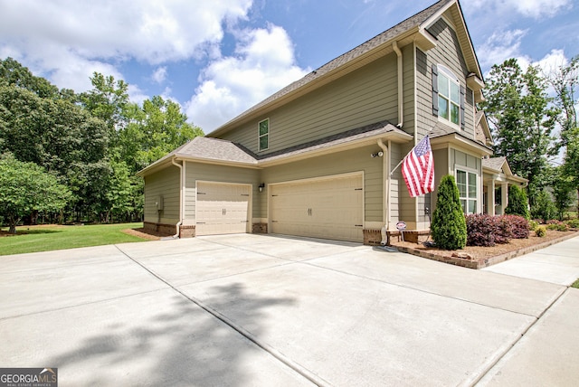 29 Peppertree Dr, Newnan, GA 30265 - view of side of property with concrete driveway, an attached garage, a yard, and brick siding