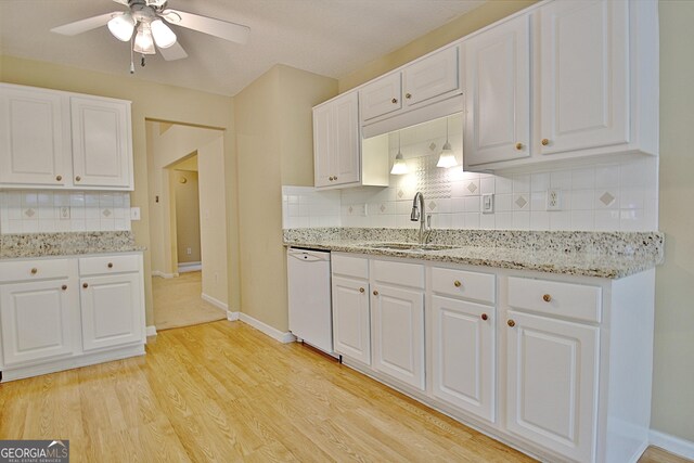4135 Coursey Lake Rd, Douglasville, GA 30135 - kitchen featuring dishwasher, tasteful backsplash, ceiling fan, white cabinets, and light wood-style floors