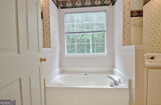4135 Coursey Lake Rd, Douglasville, GA 30135 - bathroom featuring a bath and vanity