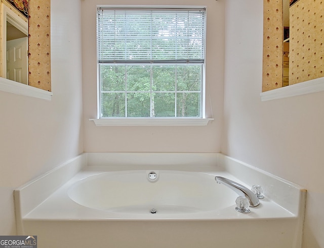 4135 Coursey Lake Rd, Douglasville, GA 30135 - bathroom with a bath