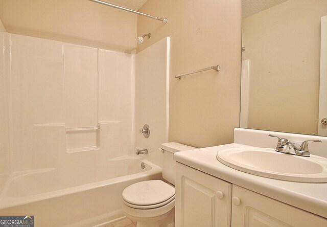 4135 Coursey Lake Rd, Douglasville, GA 30135 - bathroom featuring a textured ceiling, vanity, shower / tub combination, and tile patterned floors