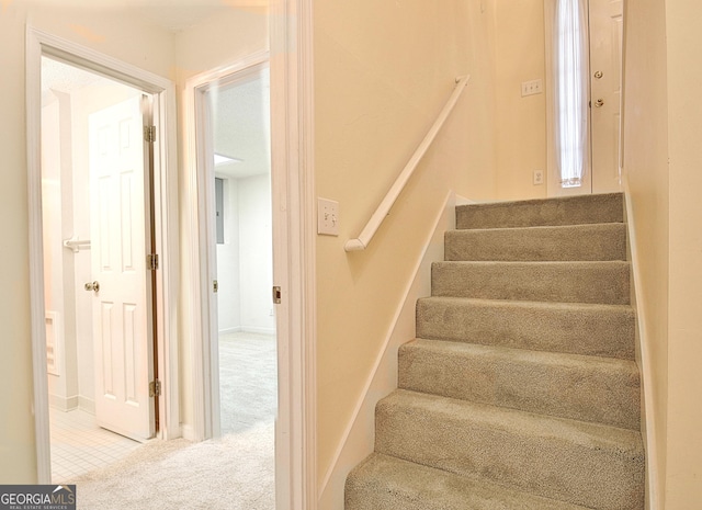 4135 Coursey Lake Rd, Douglasville, GA 30135 - staircase with carpet floors