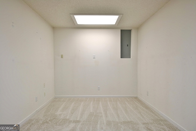 4135 Coursey Lake Rd, Douglasville, GA 30135 - unfurnished room with electric panel, light carpet, and a textured ceiling