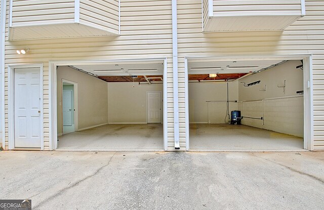 4135 Coursey Lake Rd, Douglasville, GA 30135 - garage with driveway
