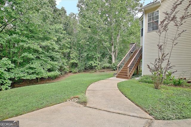 4135 Coursey Lake Rd, Douglasville, GA 30135 - view of grassy yard featuring stairway