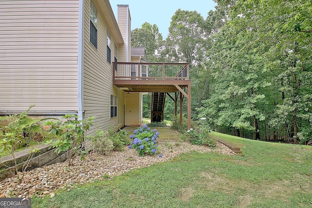 4135 Coursey Lake Rd, Douglasville, GA 30135 - view of grassy yard featuring a deck