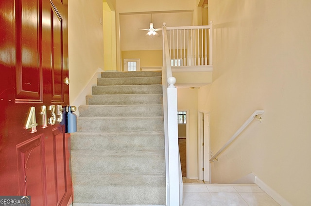 4135 Coursey Lake Rd, Douglasville, GA 30135 - staircase with ceiling fan, tile patterned flooring, and plenty of natural light