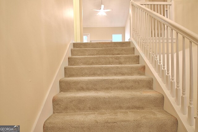 4135 Coursey Lake Rd, Douglasville, GA 30135 - stairs featuring a ceiling fan