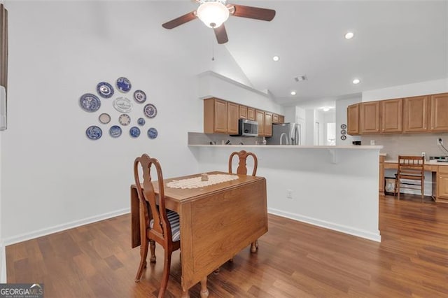 1402 Silver Smt, Conyers, GA 30094 - dining space with ceiling fan, wood finished floors, recessed lighting, and high vaulted ceiling