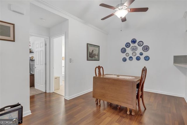1402 Silver Smt, Conyers, GA 30094 - dining space featuring wood finished floors, ceiling fan, and ornamental molding