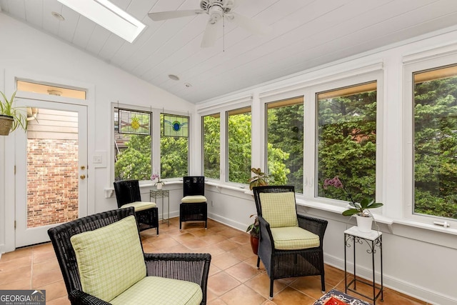 1508 Brianwood Rd Unit 1508, Decatur, GA 30033 - sunroom with lofted ceiling, a ceiling fan, tile patterned flooring, and a skylight
