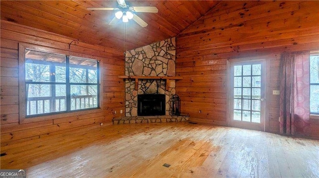 2515 Camp Branch Rd, Ellijay, GA 30540 - unfurnished living room featuring wood-type flooring, vaulted ceiling, ceiling fan, a fireplace, and wood ceiling