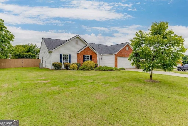 4735 Widgeon Way, Cumming, GA 30028 - view of front of home with a garage, driveway, and brick siding