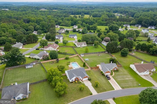 4735 Widgeon Way, Cumming, GA 30028 - aerial view of residential area featuring a heavily wooded area