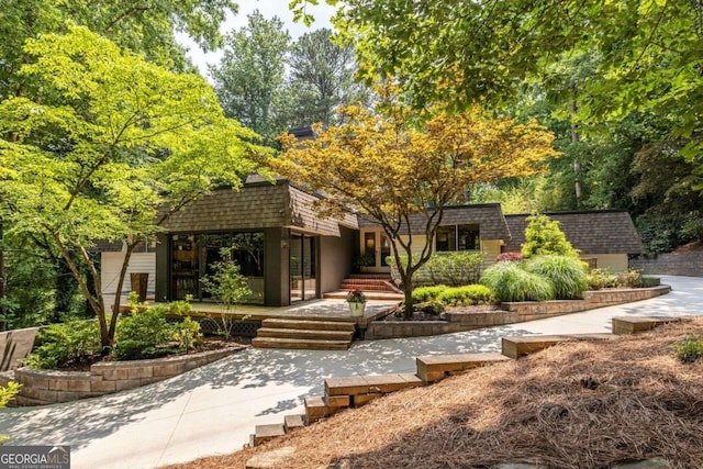 4850 Lake Fjord Pass, Marietta, GA 30068 - view of front of property with mansard roof and a shingled roof