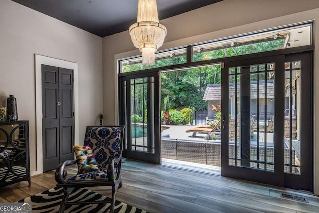 4850 Lake Fjord Pass, Marietta, GA 30068 - entryway with wood finished floors and a chandelier