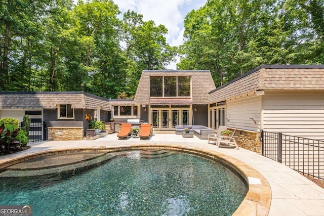 4850 Lake Fjord Pass, Marietta, GA 30068 - swimming pool with an outdoor living space, a patio area, and french doors