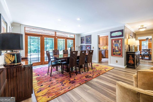 4850 Lake Fjord Pass, Marietta, GA 30068 - dining room with french doors, crown molding, light wood-type flooring, and recessed lighting