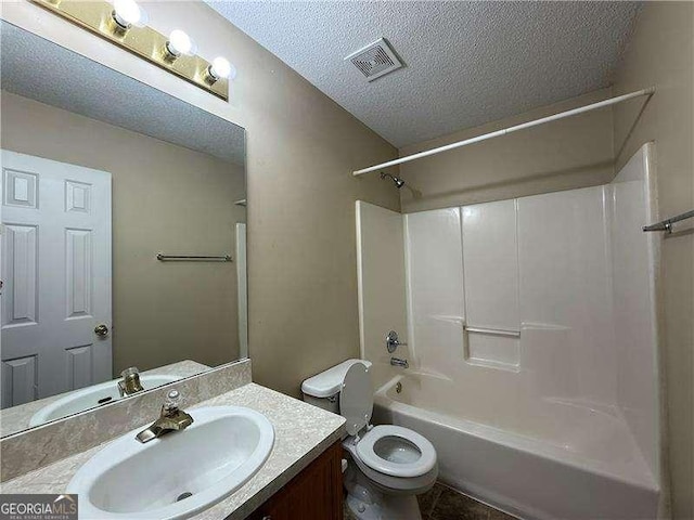 296 Hayes Trce, Hiram, GA 30141 - bathroom with a textured ceiling, vanity, and bathing tub / shower combination