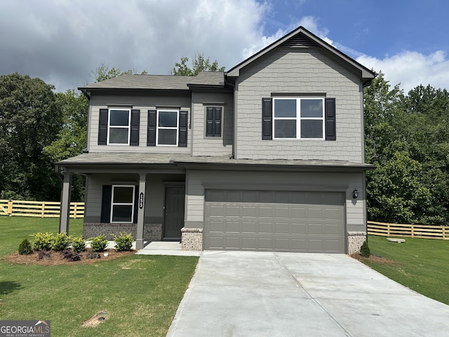 155 Roxeywood Way, Winder, GA 30680 - craftsman-style home with driveway, a garage, brick siding, and a porch