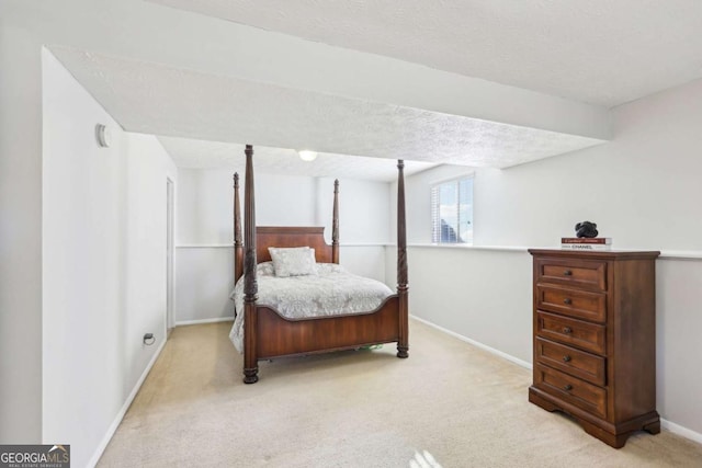 10475 Willow Meadow Cir, Alpharetta, GA 30022 - carpeted bedroom featuring baseboards and a textured ceiling