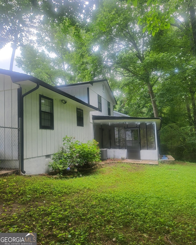 6118 Dana Ct Unit 6, Lithonia, GA 30058 - back of property featuring a sunroom, crawl space, and a yard