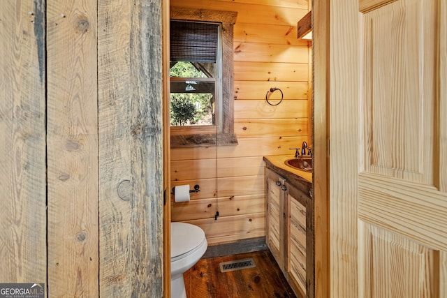 307 Big Timber Rd, Mineral Bluff, GA 30559 - half bathroom featuring vanity, wood walls, and wood finished floors