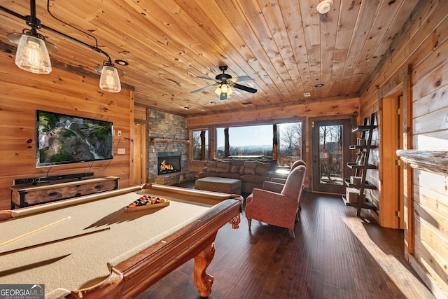 307 Big Timber Rd, Mineral Bluff, GA 30559 - game room featuring wood walls, a stone fireplace, wood ceiling, dark wood finished floors, and a ceiling fan