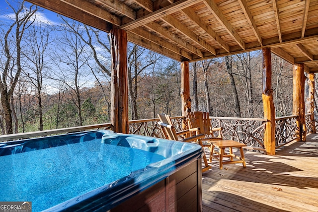 307 Big Timber Rd, Mineral Bluff, GA 30559 - wooden deck with a hot tub and a forest view
