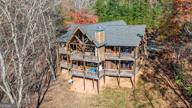 307 Big Timber Rd, Mineral Bluff, GA 30559 - rear view of house featuring a balcony, a shingled roof, a chimney, and a wooden deck