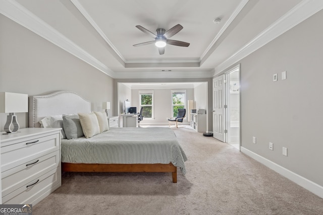 733 Wexford Cove Way, Mableton, GA 30126 - carpeted bedroom with a tray ceiling, ornamental molding, and a ceiling fan