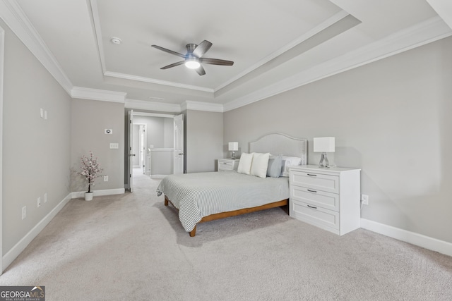 733 Wexford Cove Way, Mableton, GA 30126 - bedroom with a raised ceiling, ornamental molding, light carpet, and a ceiling fan