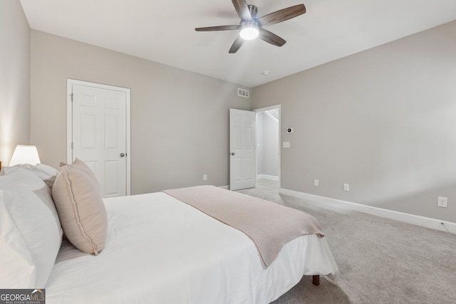 733 Wexford Cove Way, Mableton, GA 30126 - bedroom with light colored carpet and ceiling fan