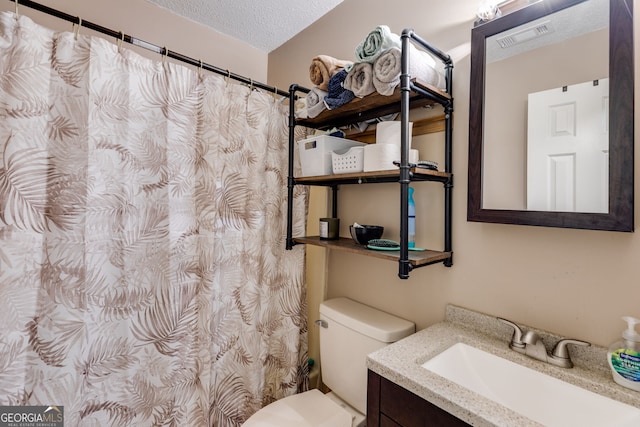 327 Old Muse Rd, Carrollton, GA 30116 - bathroom with vanity, a textured ceiling, and a shower with shower curtain