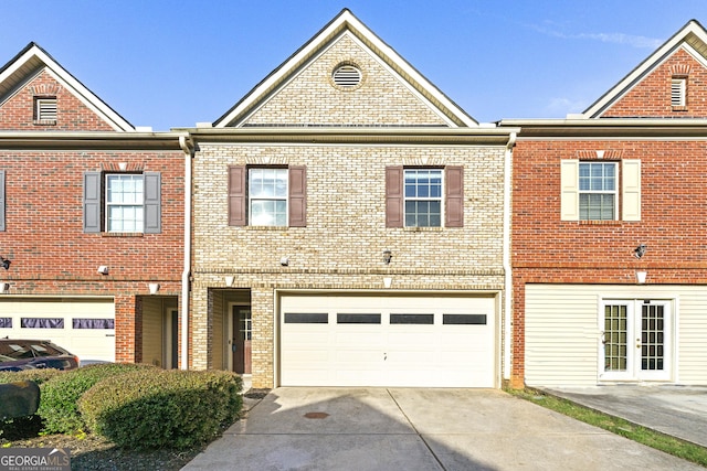 7177 Fringe Flower Dr, Austell, GA 30168 - multi unit property featuring concrete driveway, brick siding, and a garage