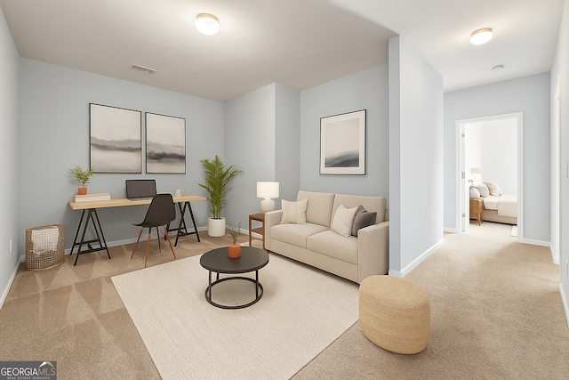 7177 Fringe Flower Dr, Austell, GA 30168 - carpeted living area featuring a desk and baseboards