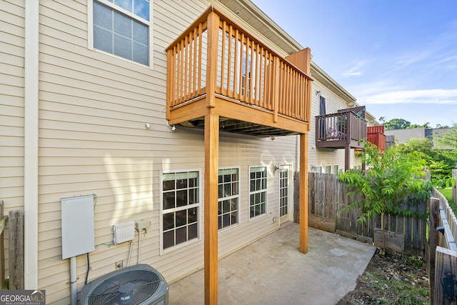 7177 Fringe Flower Dr, Austell, GA 30168 - fenced backyard with a patio area and a wooden deck