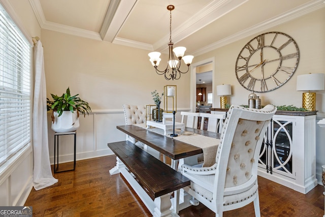 117 Elkins Blvd, Locust Grove, GA 30248 - dining space featuring healthy amount of natural light, a chandelier, crown molding, wood finished floors, and wainscoting