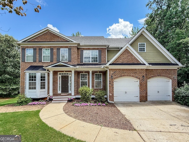 35 Paddle Boat Cv, Senoia, GA 30276 - view of front of property with concrete driveway, brick siding, and a garage