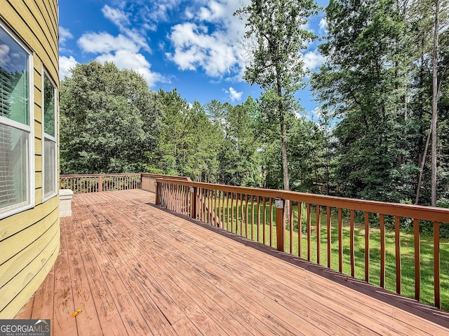 35 Paddle Boat Cv, Senoia, GA 30276 - wooden deck with a yard and view of wooded area