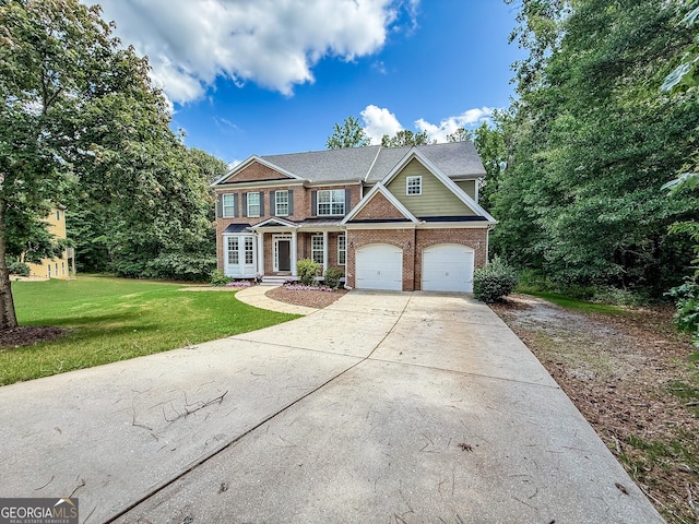 35 Paddle Boat Cv, Senoia, GA 30276 - view of front of home featuring brick siding, driveway, a front lawn, and a garage