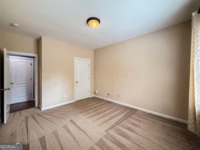 35 Paddle Boat Cv, Senoia, GA 30276 - unfurnished bedroom featuring baseboards and carpet flooring