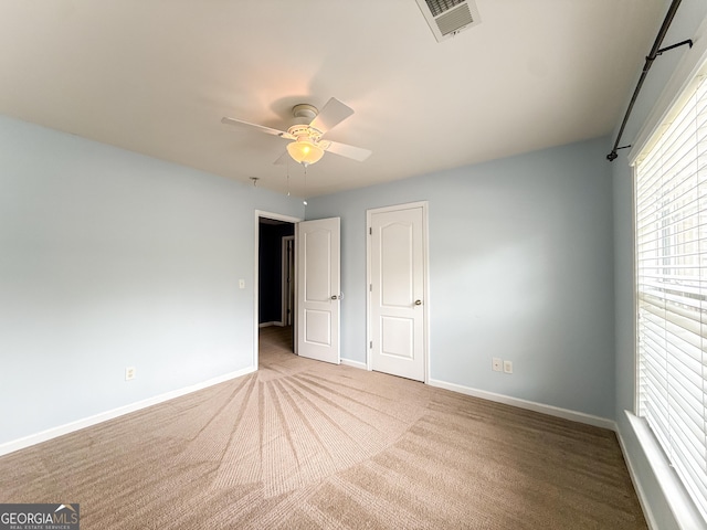 35 Paddle Boat Cv, Senoia, GA 30276 - unfurnished bedroom with carpet and ceiling fan
