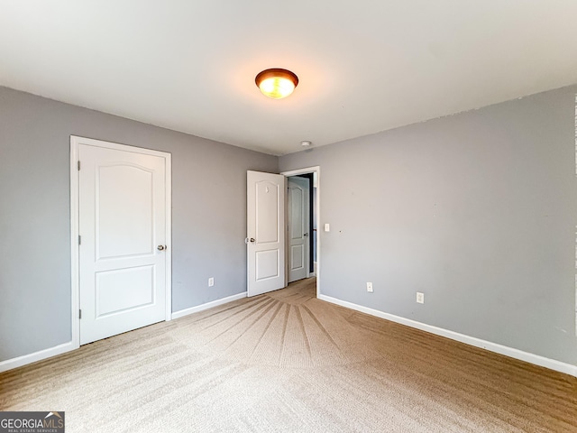 35 Paddle Boat Cv, Senoia, GA 30276 - unfurnished bedroom with carpet floors and baseboards