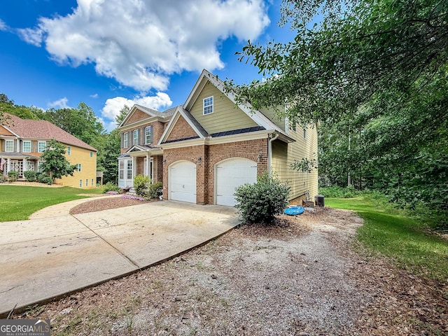 35 Paddle Boat Cv, Senoia, GA 30276 - view of front facade with driveway, brick siding, a garage, and a front lawn